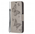 Housse Xiaomi Redmi Note 10/10S/Poco M5s Papillons Imprimés à Lanière