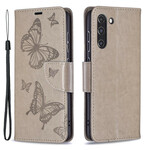 Housse Samsung Galaxy S21 FE Les Papillons en Vol avec Lanière Housse Samsung Galaxy S21 FE Les Papillons en Vol avec Lanière