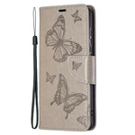 Housse Samsung Galaxy S21 FE Les Papillons en Vol avec Lanière Housse Samsung Galaxy S21 FE Les Papillons en Vol avec Lanière