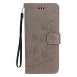 Housse iPhone 13 Papillons et Fleurs à Lanière Housse iPhone 13 Papillons et Fleurs à Lanière