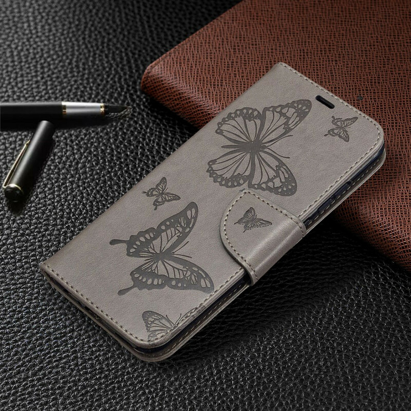 Housse Huawei P Smart Plus 2020 Les Papillons en Vol avec Lanière